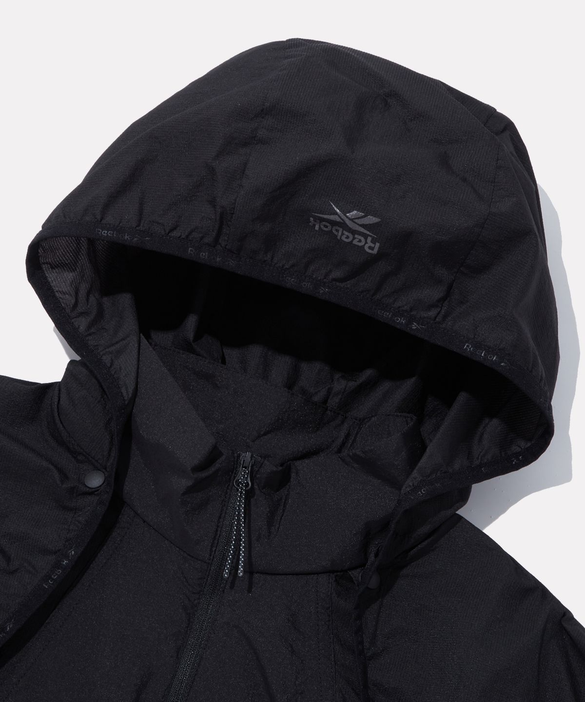 리복(REEBOK) 디테처블 경량 윈드브레이커 (W) - 블랙