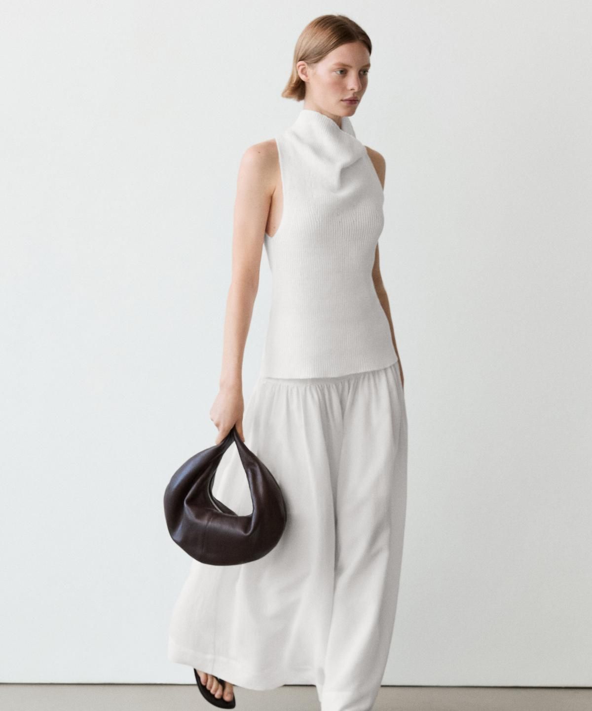 마시모두띠(MASSIMO DUTTI) 요크 디테일 미디 스커트