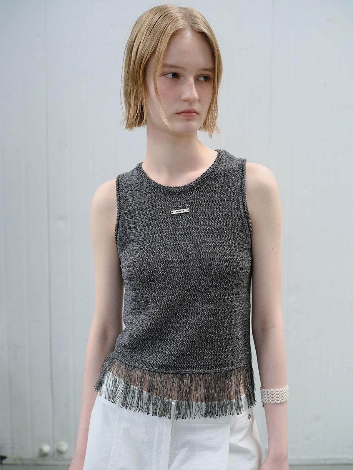 레이브(RAIVE) Tassle Deatail Sleeveless Knit VK6MP555_2color