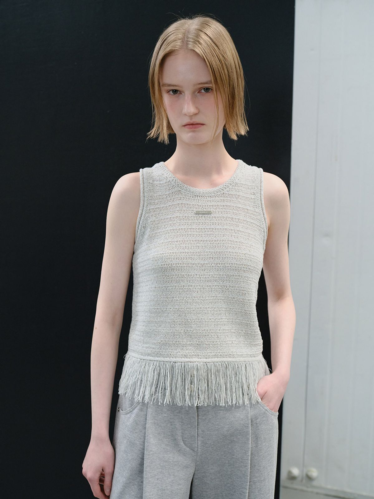 레이브(RAIVE) Tassle Deatail Sleeveless Knit VK6MP555_2color