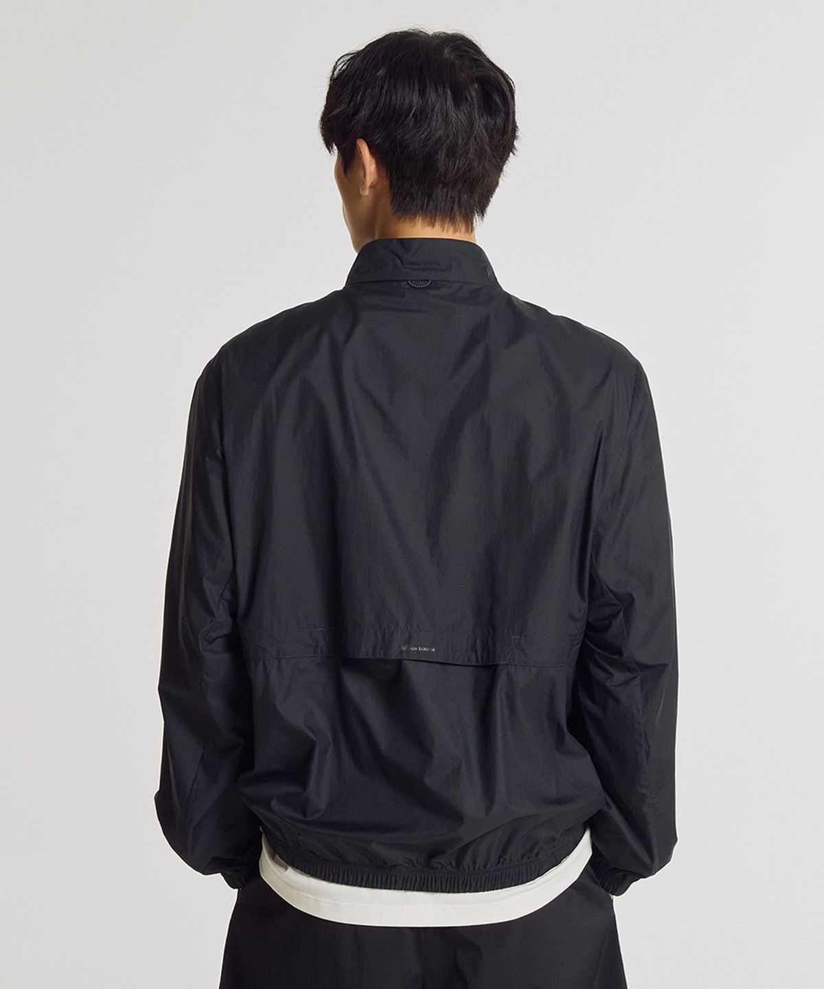 뉴발란스(NEW BALANCE) NBNAGCA023 / UNI 초경량 아우터 점퍼 (BLACK)