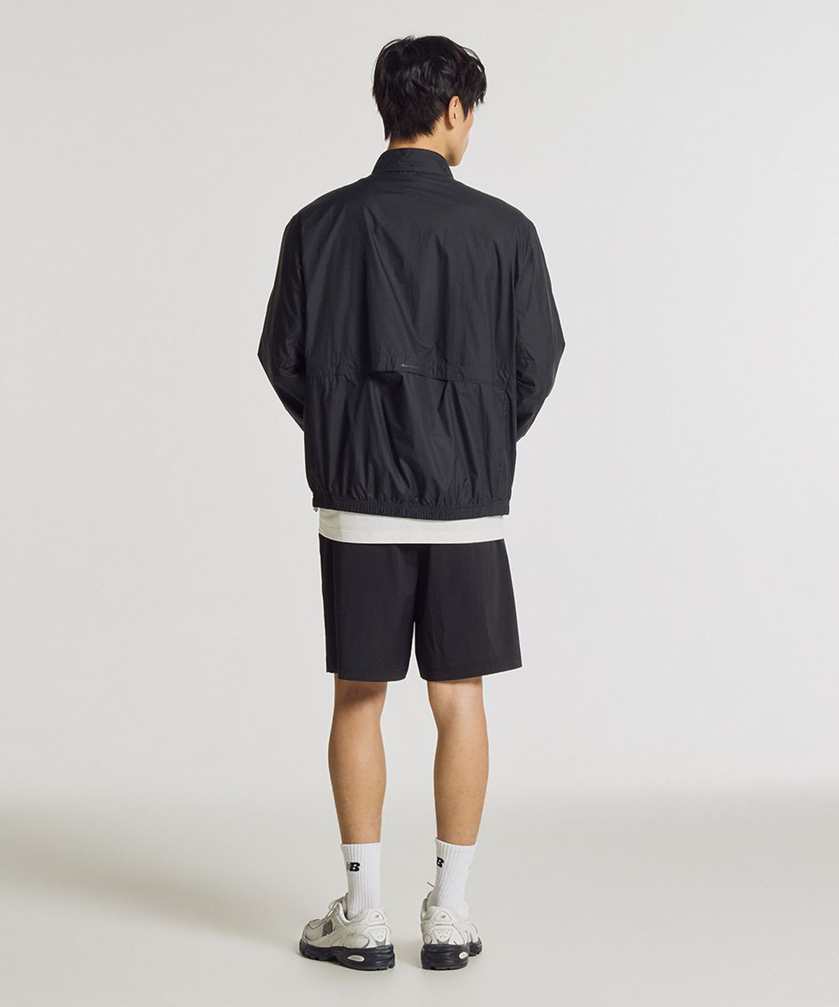 뉴발란스(NEW BALANCE) NBNAGCA023 / UNI 초경량 아우터 점퍼 (BLACK)