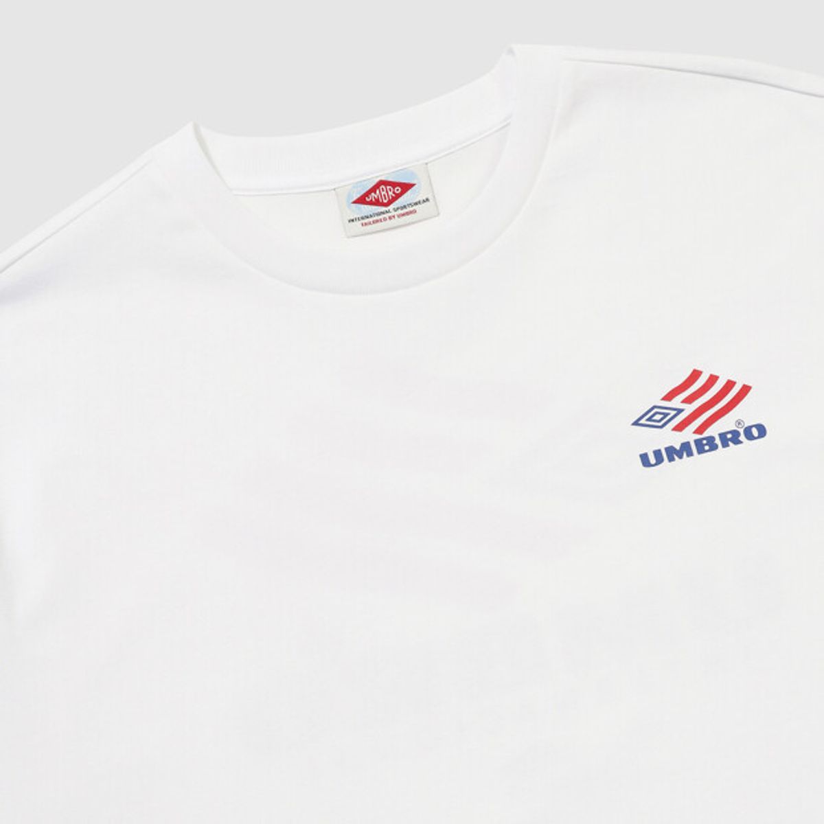 엄브로(UMBRO) HBL 스타챔프 그래픽 반팔 티셔츠 아이보리 UR211CRS51