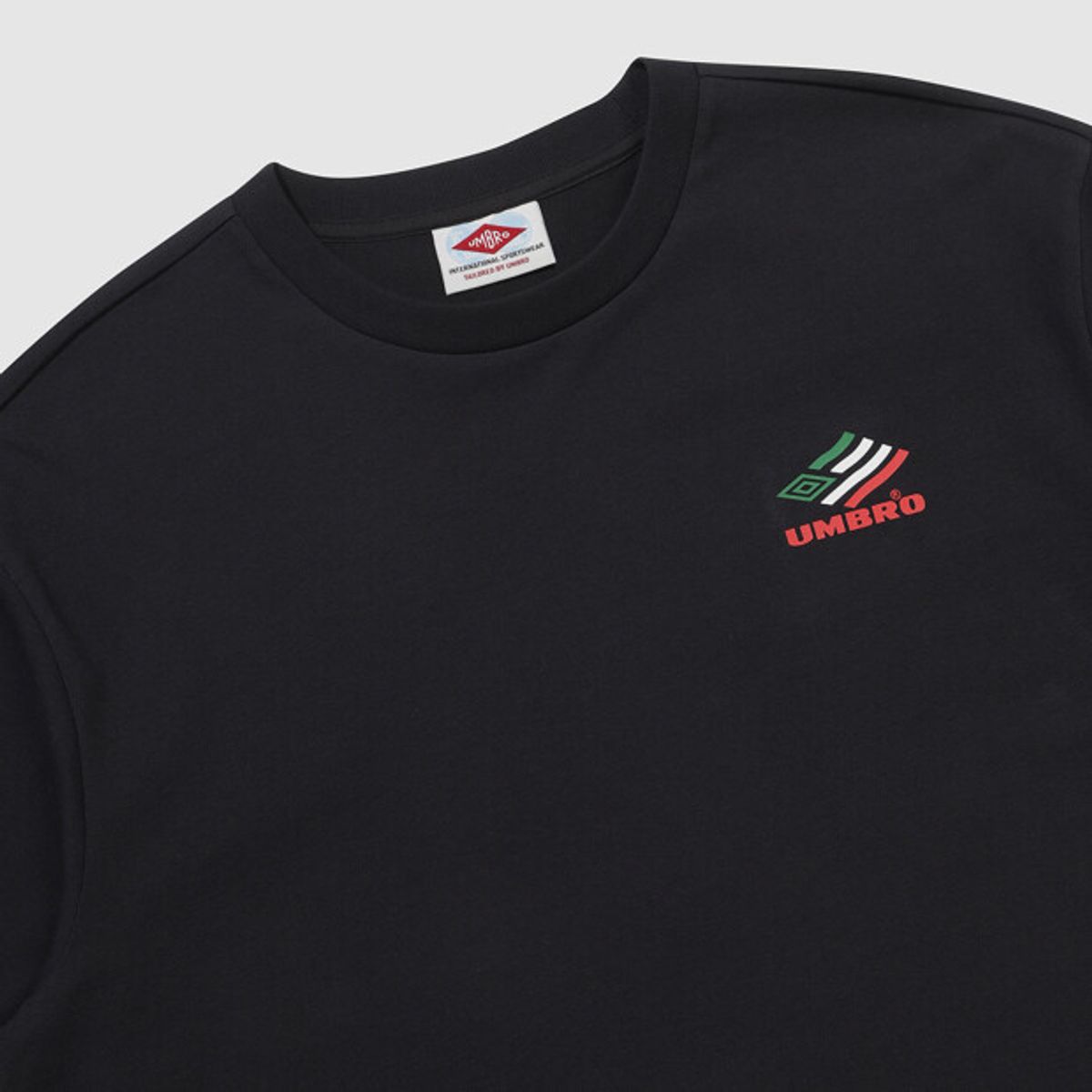 엄브로(UMBRO) HBL 스타챔프 그래픽 반팔 티셔츠 블랙 UR211CRS51