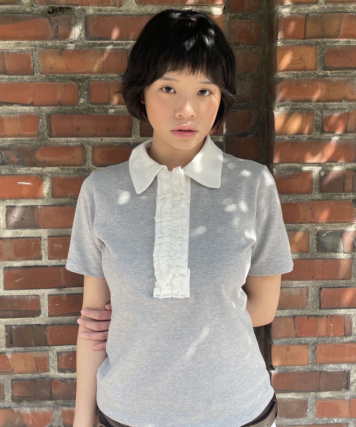 키코지(KIKOZY) 러플 피케이 티셔츠 그레이