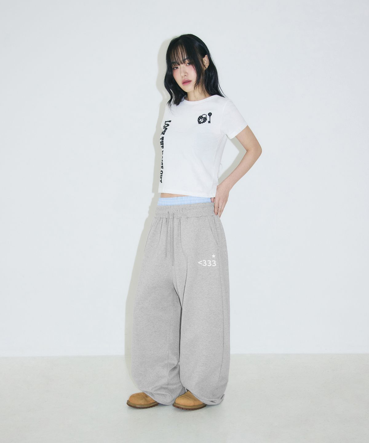 슬릭글로우(SLEEKGLOW) 러브 이모지 체크 레이어드 스웨트 팬츠[그레이]