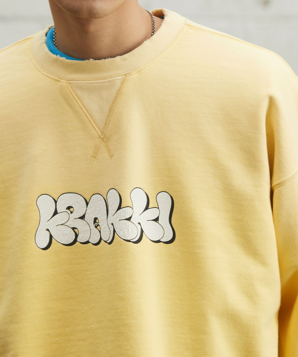 크래키(KRAKKI) [Unisex] Round Logo Sweatshirt_Yellow [KR265PUW411]