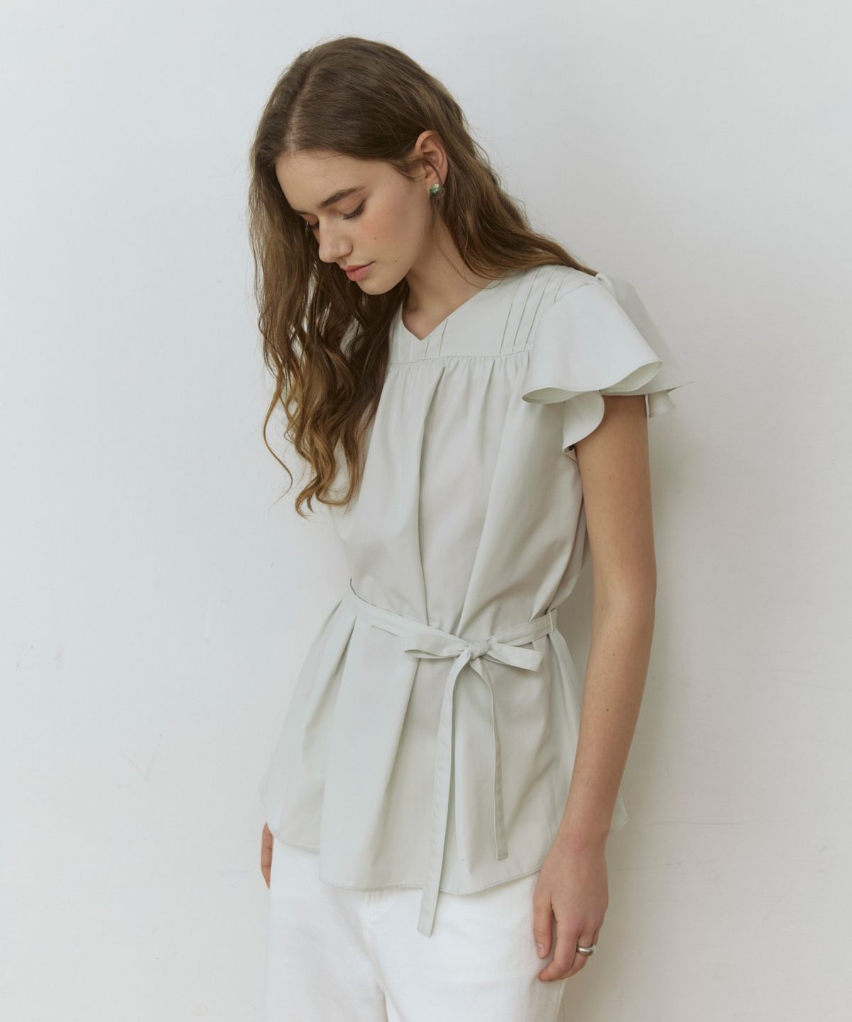 어다울(ADAUL) Pixie ruffle wing belted blouse - ash khaki