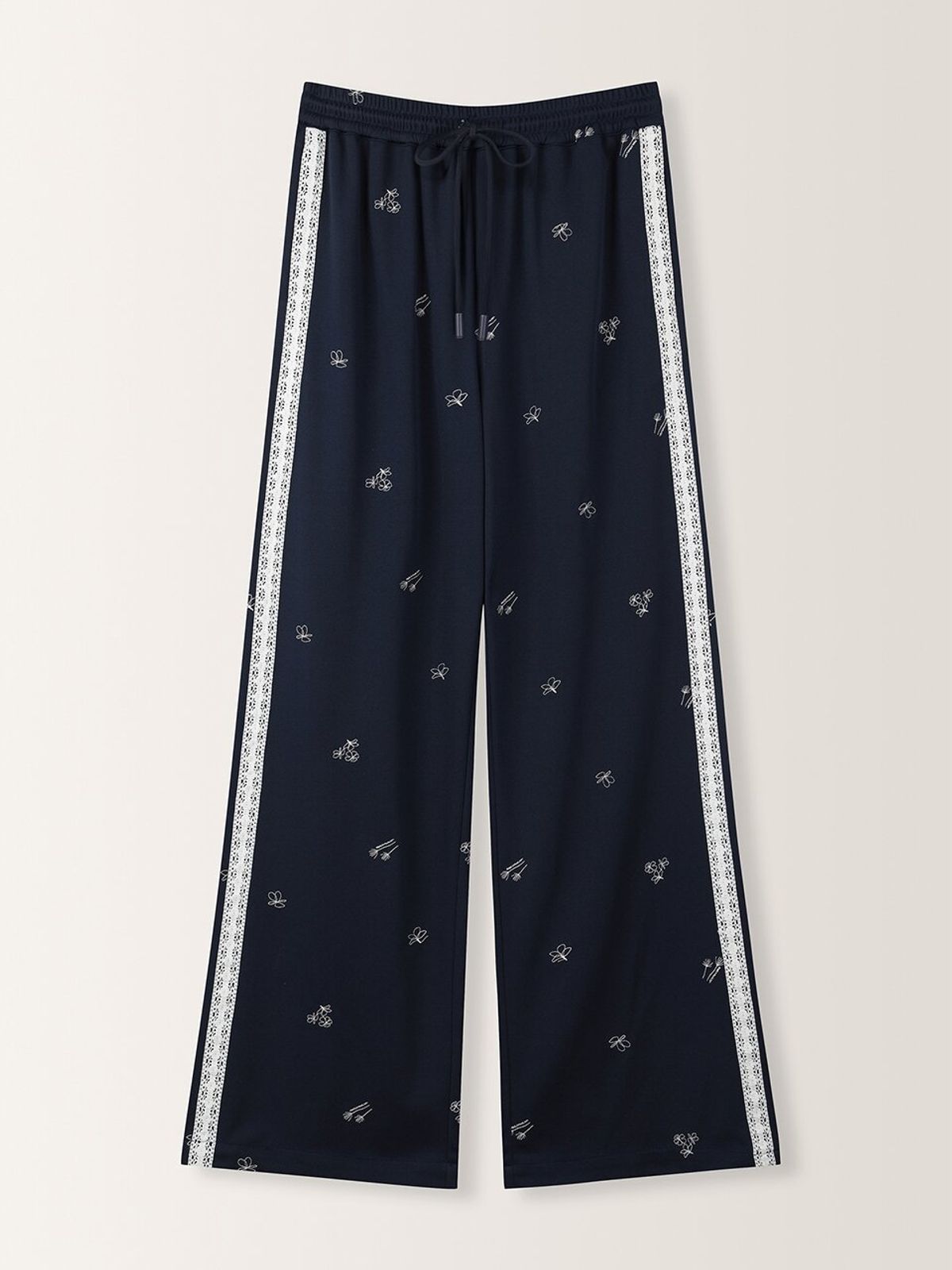 뮈뮈에르(MUEMUER) Flower Embroided Track Pants MU2633PT303M