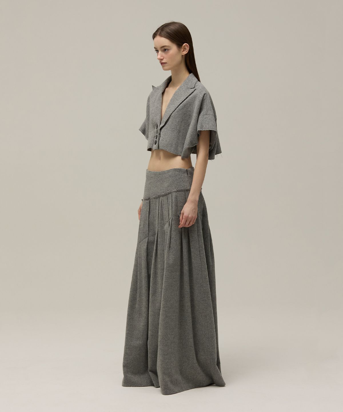 므아므(MMAM) Wool unbalanced pleated skirt