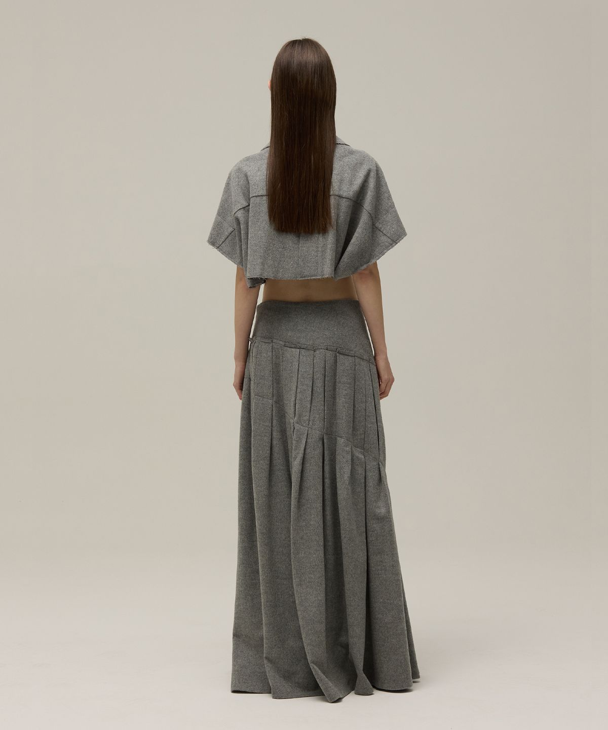 므아므(MMAM) Wool unbalanced pleated skirt