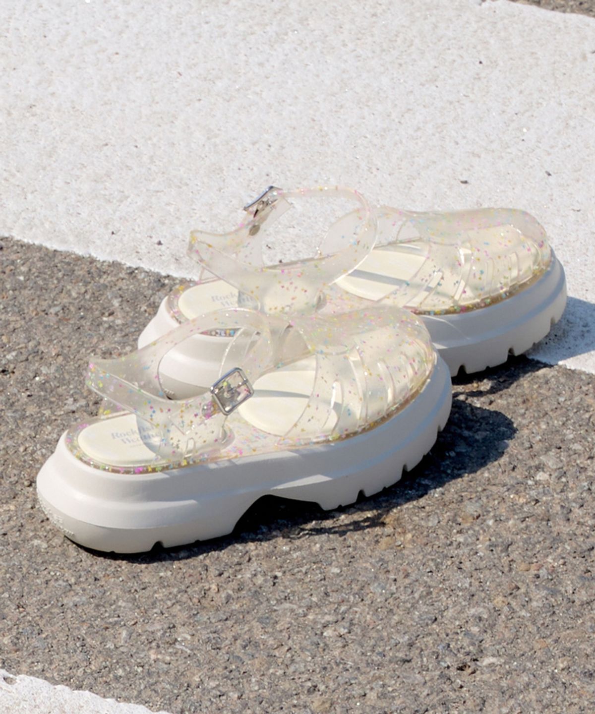 락피쉬웨더웨어(ROCKFISH WEATHERWEAR) GLAIR PLATFORM FISHERMAN SANDALS - CLEAR STAR