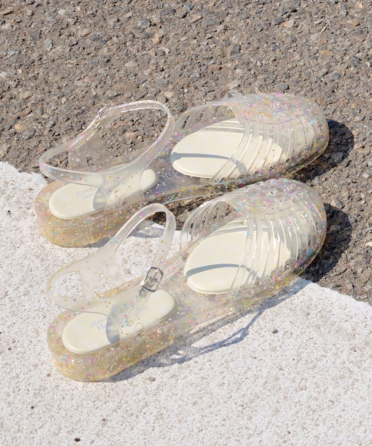락피쉬웨더웨어(ROCKFISH WEATHERWEAR) GLAIR STRAPPY SANDALS - CLEAR STAR