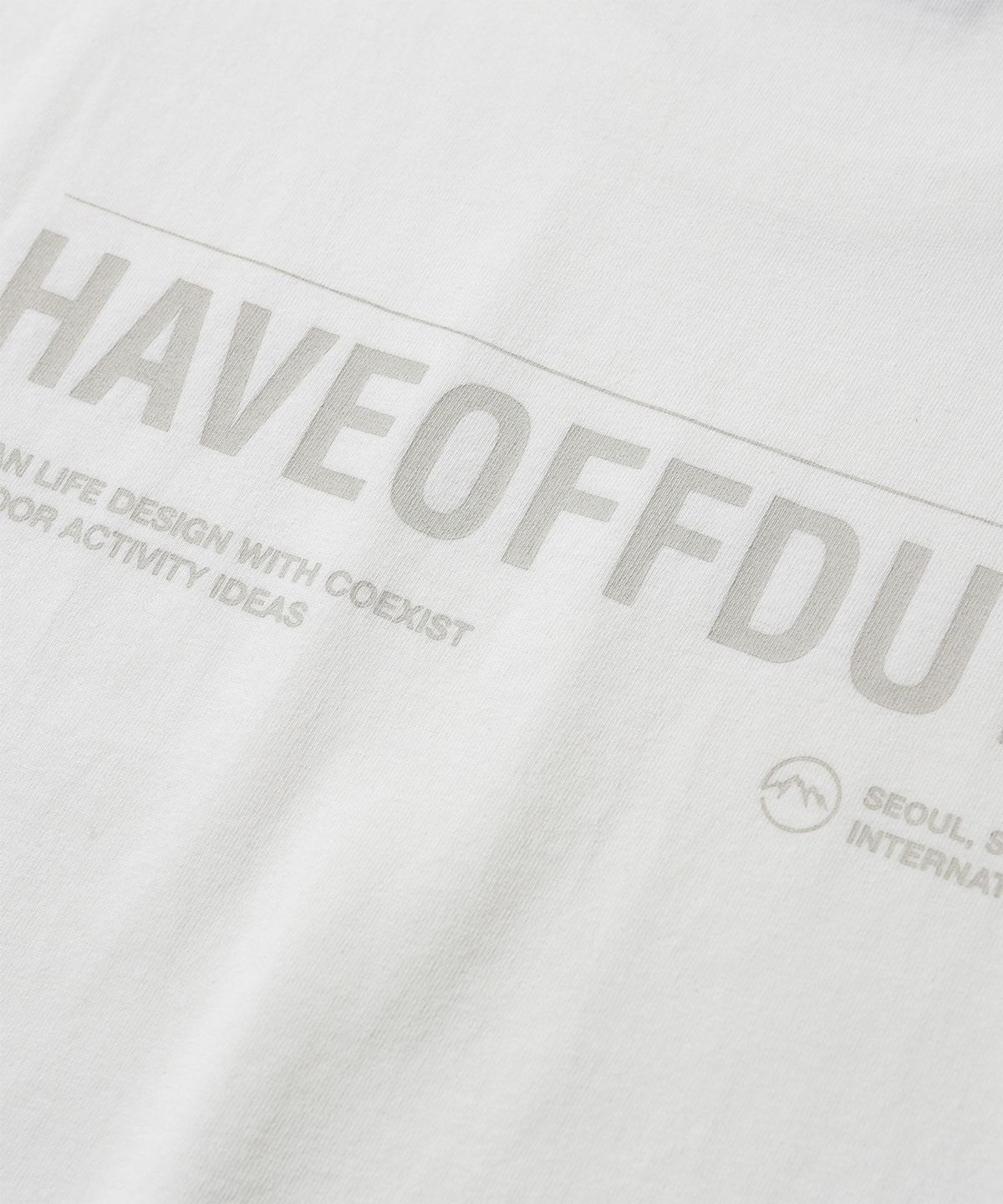 해브오프듀티(HAVEOFFDUTY) 백 로고 티 (오프화이트)