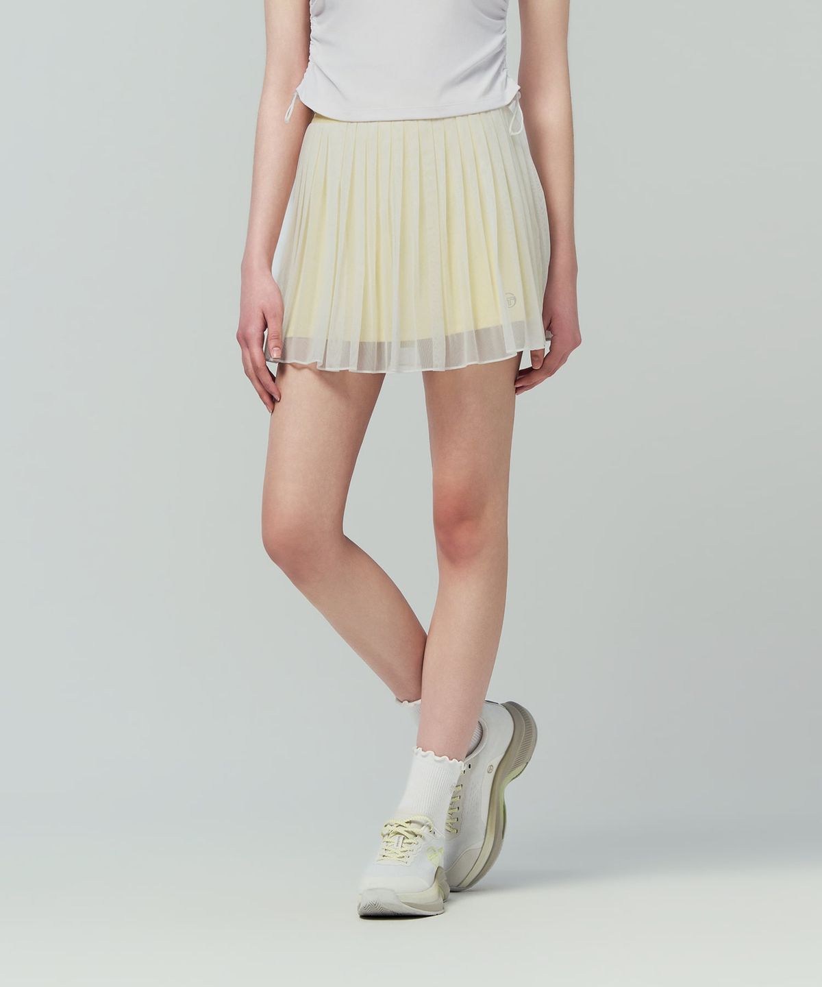 세르지오 타키니(SERGIO TACCHINI) W 타키니 플라잉 메쉬 스커트 (L.Yellow)