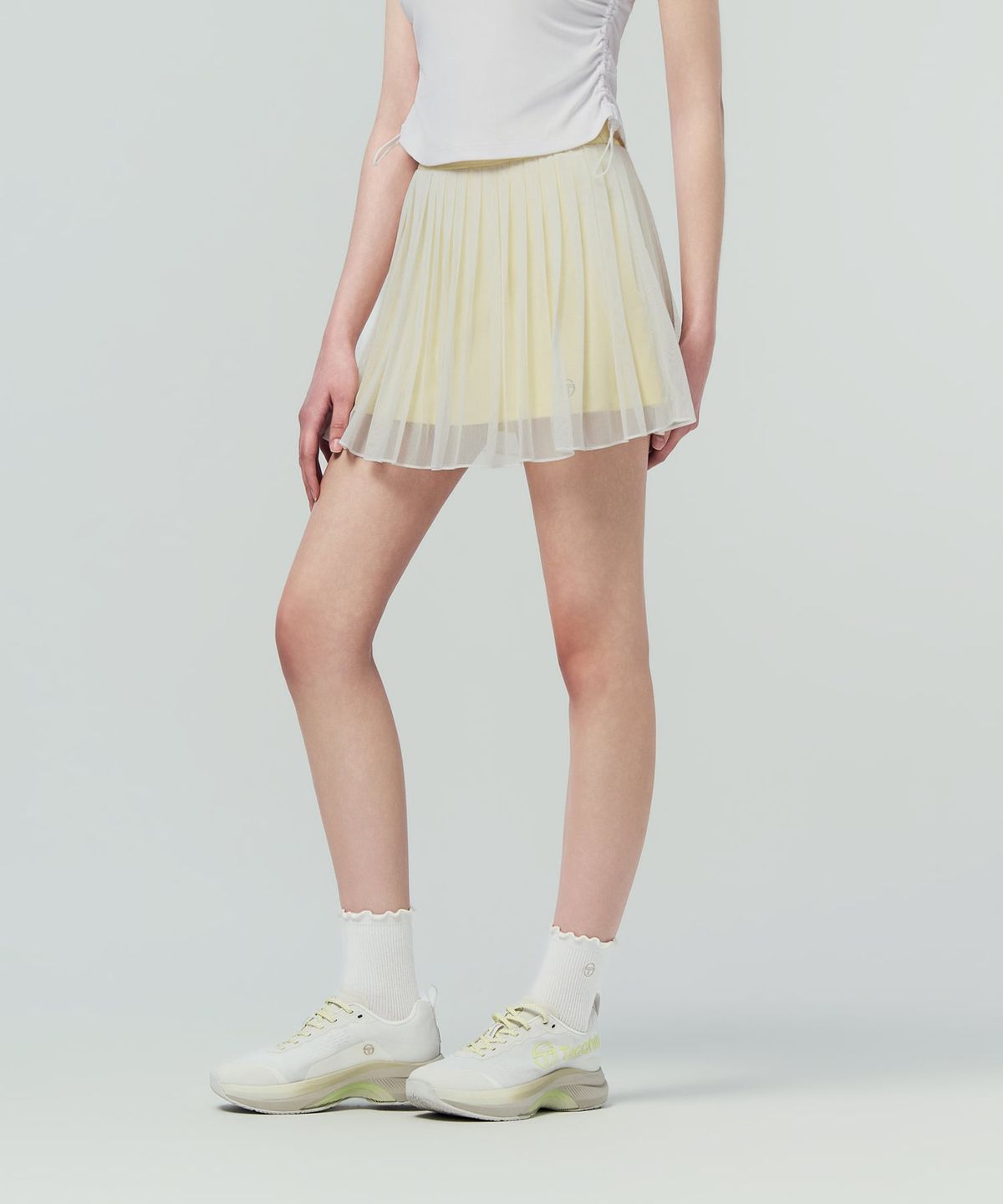 세르지오 타키니(SERGIO TACCHINI) W 타키니 플라잉 메쉬 스커트 (L.Yellow)