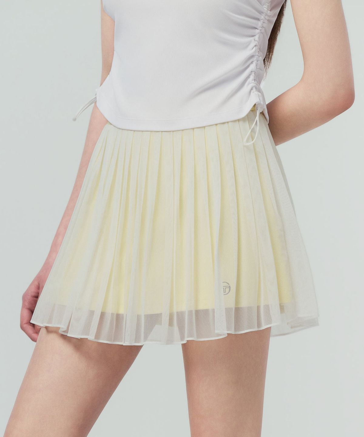 세르지오 타키니(SERGIO TACCHINI) W 타키니 플라잉 메쉬 스커트 (L.Yellow)