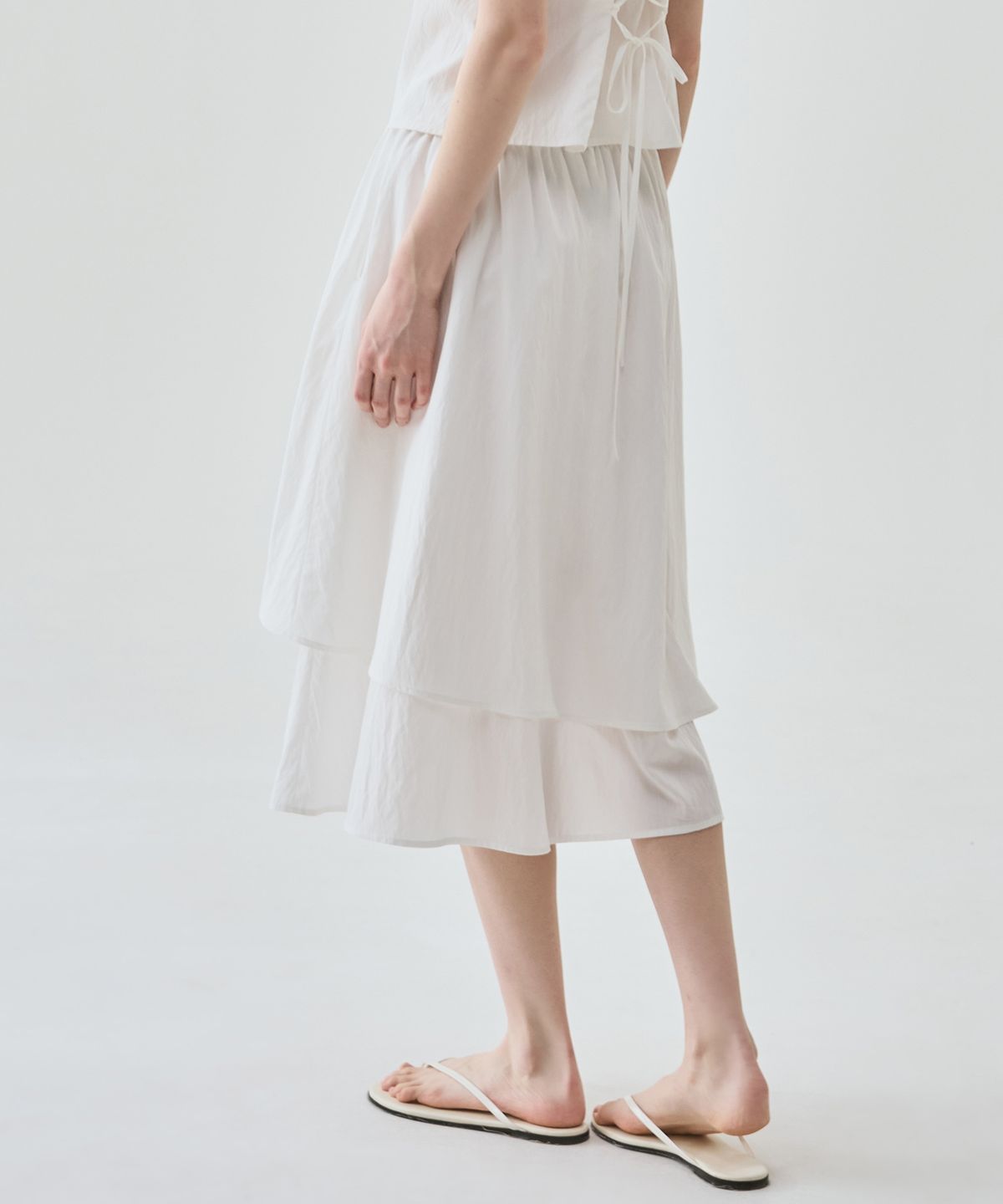 드로우핏 우먼(DRAWFIT WOMEN) 레이어 셔링 롱 플레어 스커트 [IVORY]