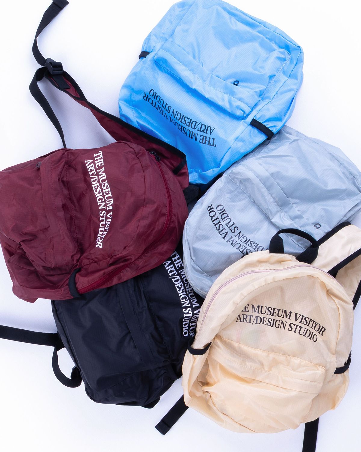더뮤지엄비지터(THEMUSEUMVISITOR) PACKABLE LOGO BACKPACK (BURGUNDY)