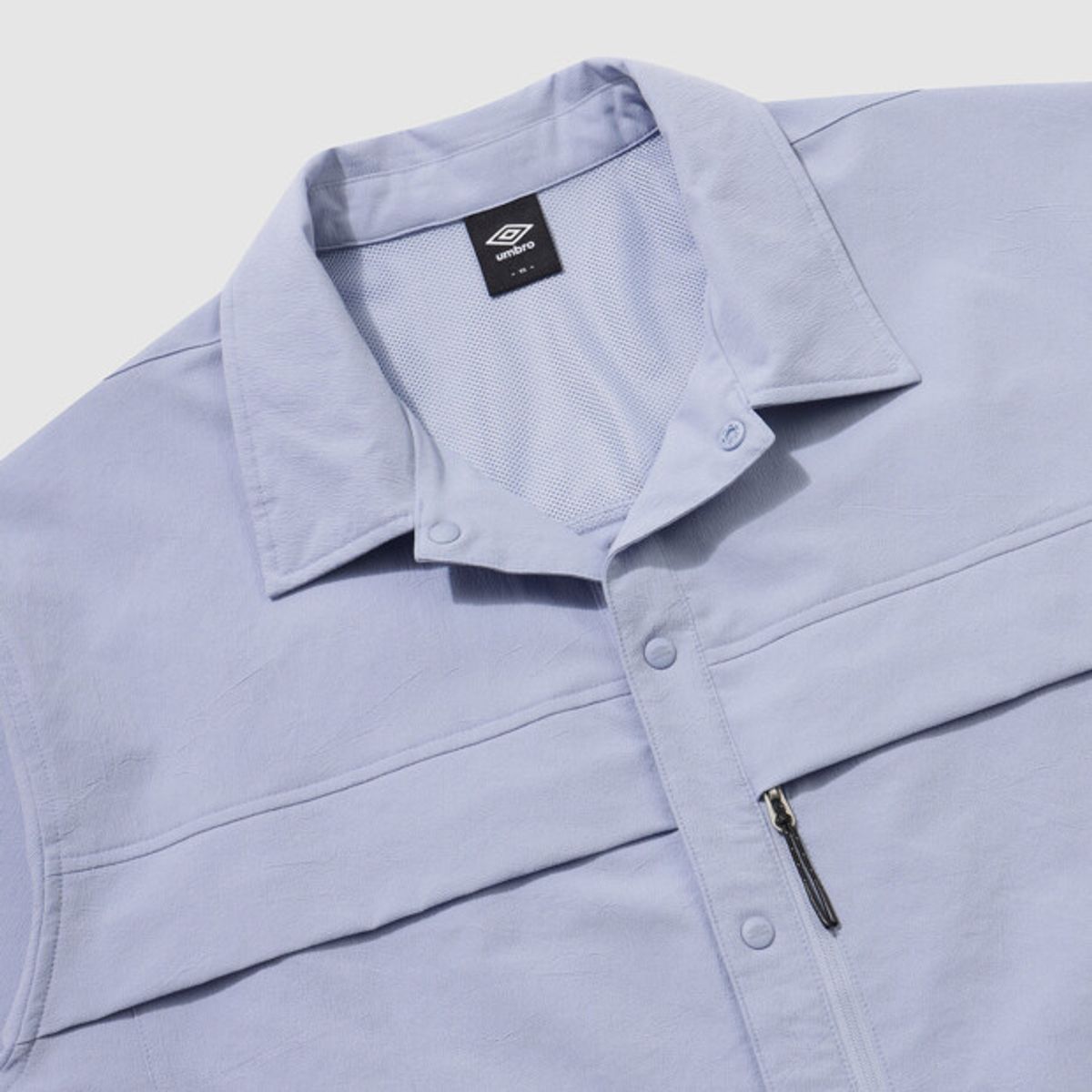 엄브로(UMBRO) 에어그리드 반팔 셔츠 스카이블루 UR211CJK42