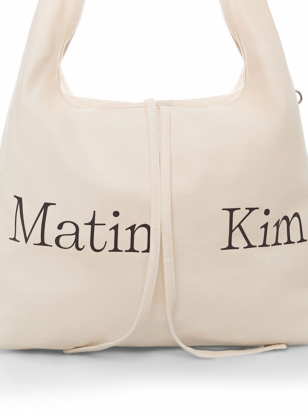 마뗑킴(MATIN KIM) LOGO POINT ROUND ECOBAG IN IVORY