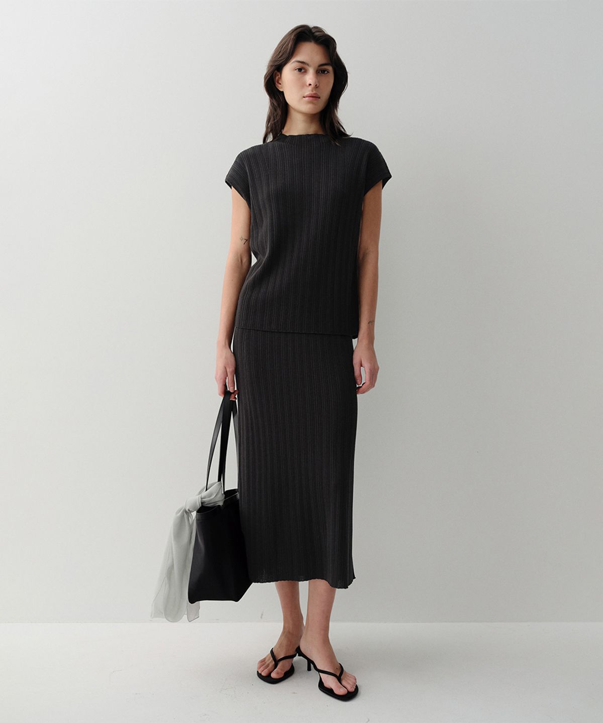 이아(EAAH) MOI PLEATS KNIT SKIRT (BLACK)