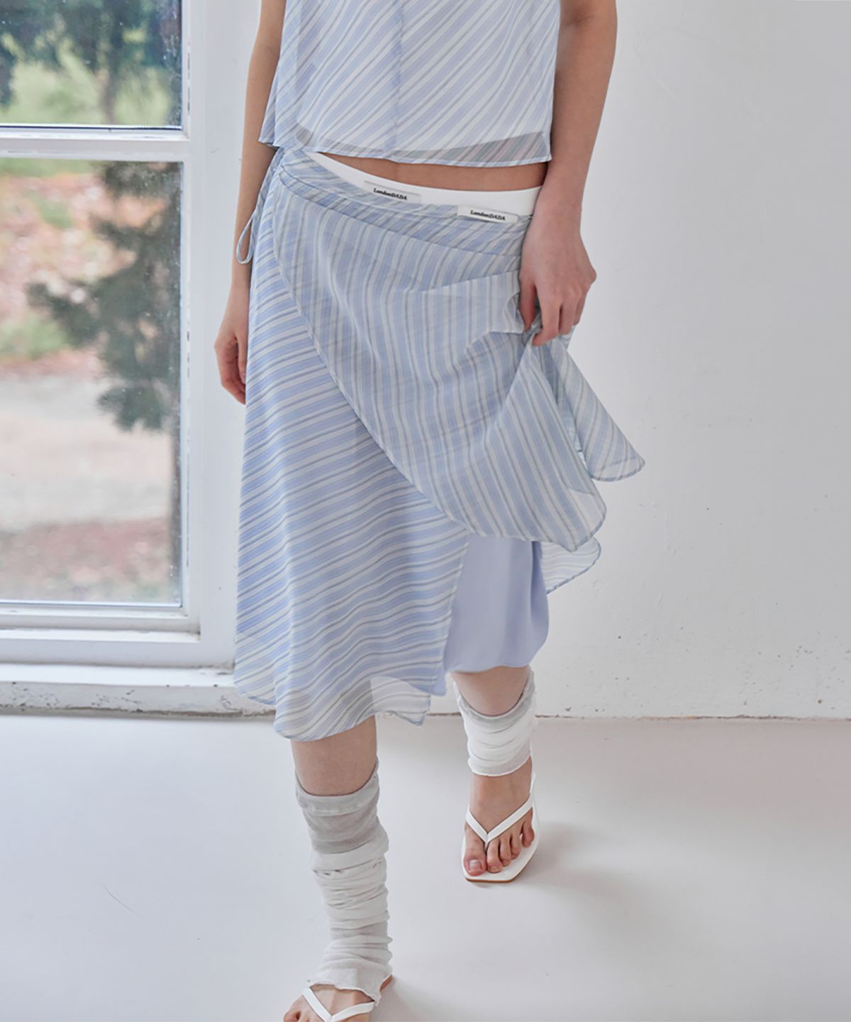 런던다다(LONDONDADA) Sheer Stripe Wrap Satin Skirt, BLUE
