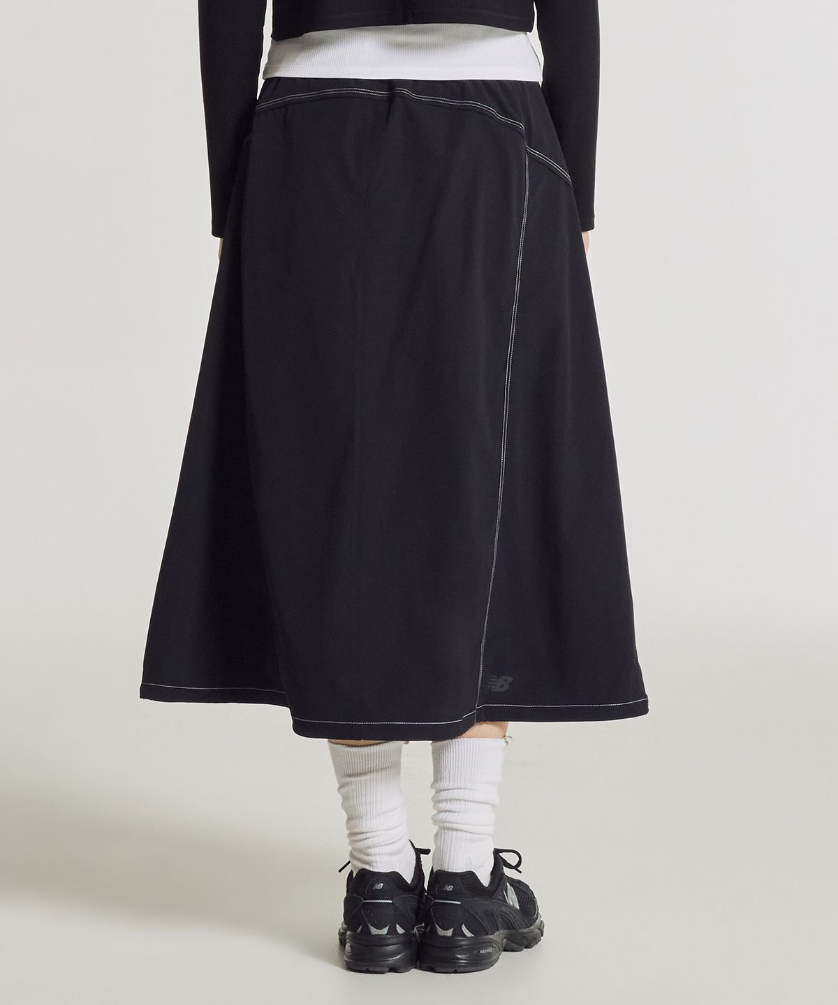 뉴발란스(NEW BALANCE) NBNWG3W612 / WOMEN FROZEN 우븐 스트레치 롱 스커트 (BLACK)