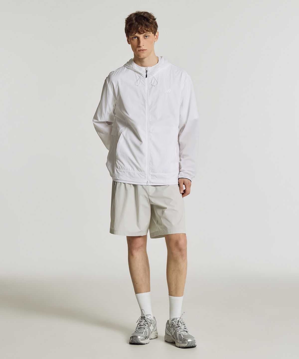 뉴발란스(NEW BALANCE) NBNAG21503 / UNI AIR 초경량 후드 바람막이 (WHITE)