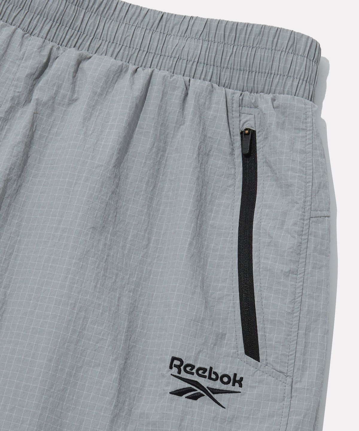 리복(REEBOK) 그리드 패턴 퍼포먼스 쇼츠 - 그레이