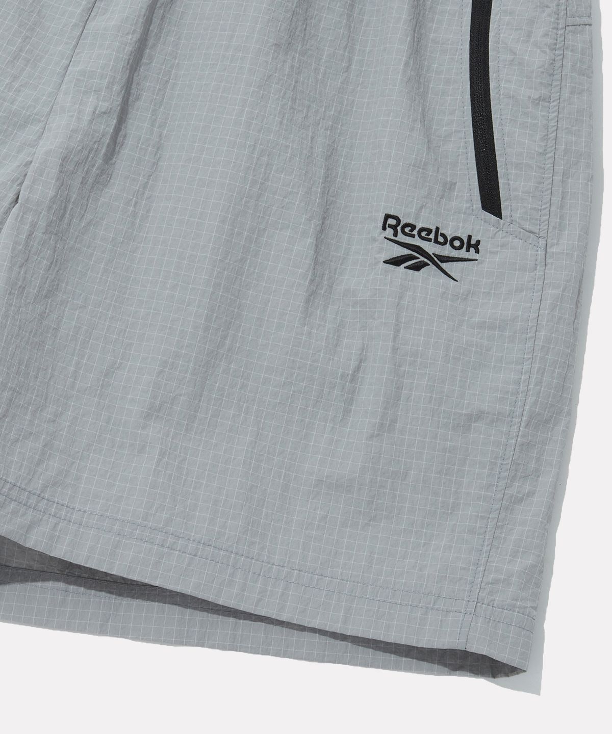 리복(REEBOK) 그리드 패턴 퍼포먼스 쇼츠 - 그레이