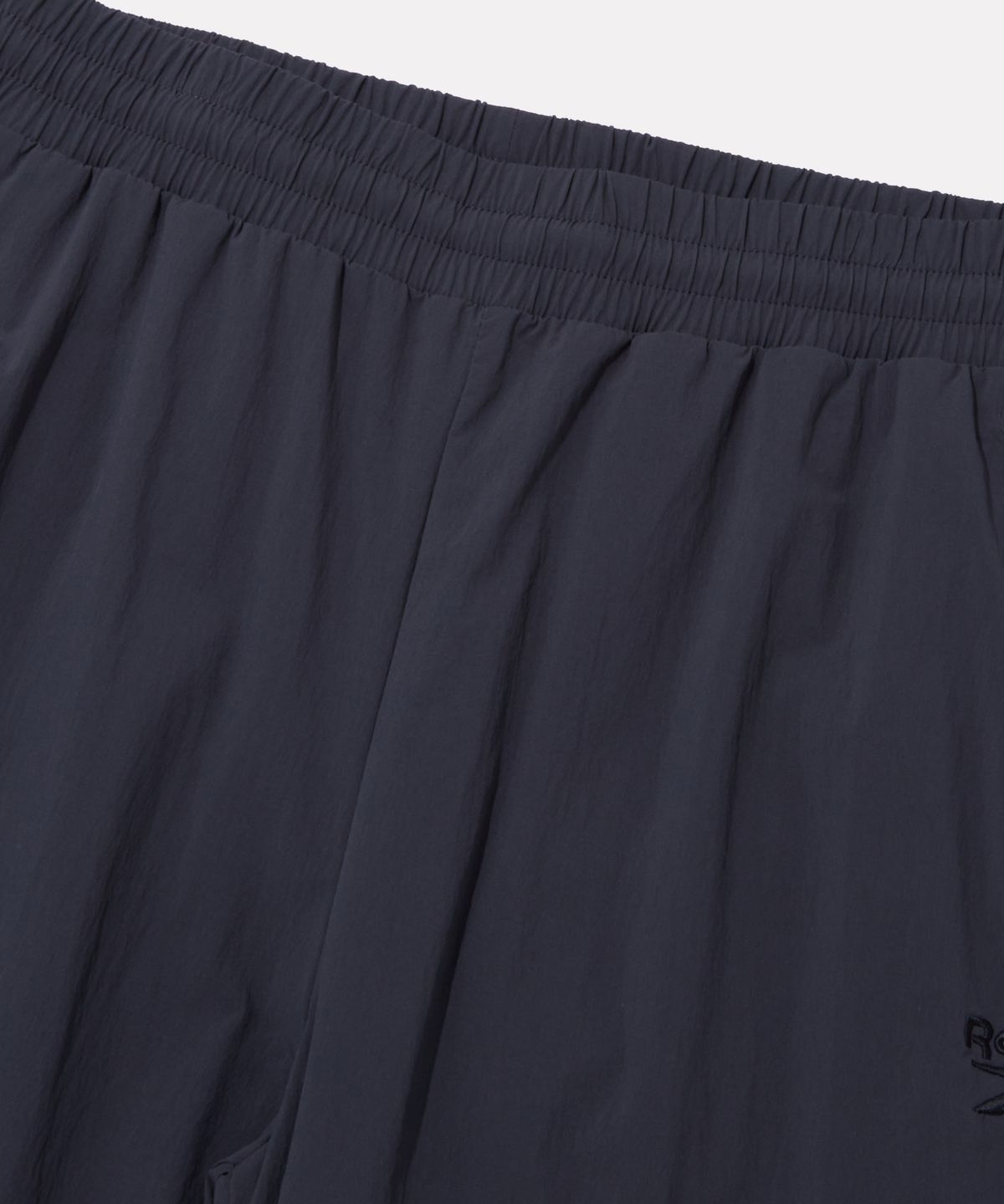 리복(REEBOK) 스트레치 조거 팬츠 - 딥 차콜