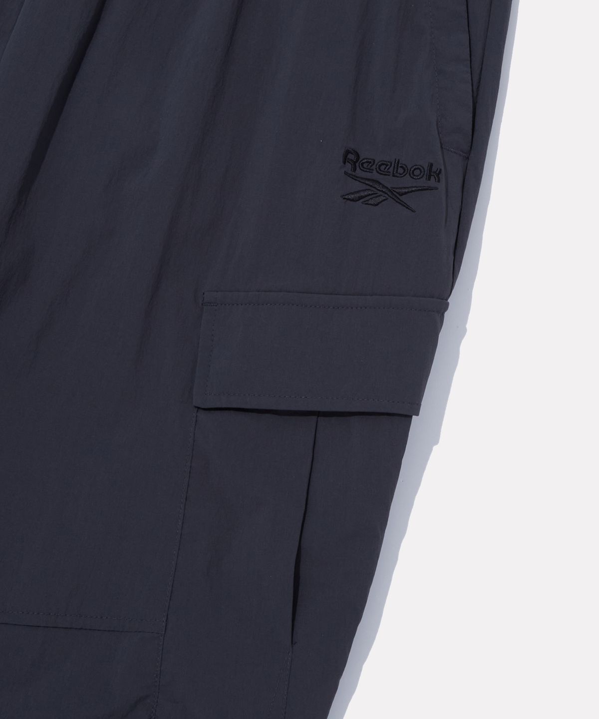 리복(REEBOK) 스트레치 조거 팬츠 - 딥 차콜