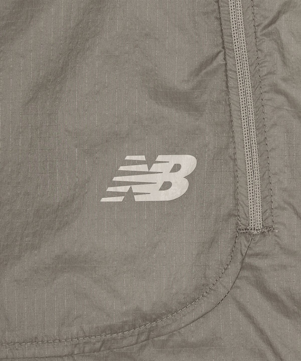뉴발란스(NEW BALANCE) NBNAG2W522 / WOMEN 브리즈라이트 초경량 셔링 우븐자켓 (DARK BEIGE)