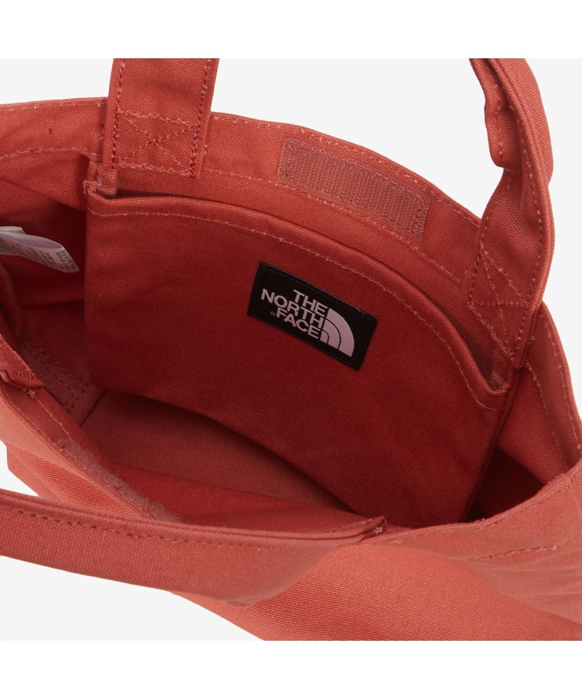 노스페이스(THE NORTH FACE) NN2PS26C 티앤에프 로고 코튼 백 스몰 DARK ORANGE