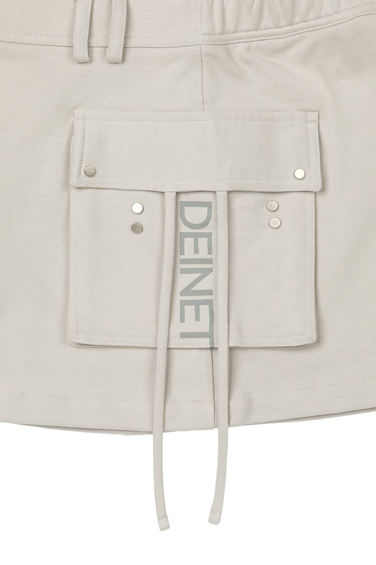 다이닛(DEINET) JERSEY MINI SKIRT IN BEIGE
