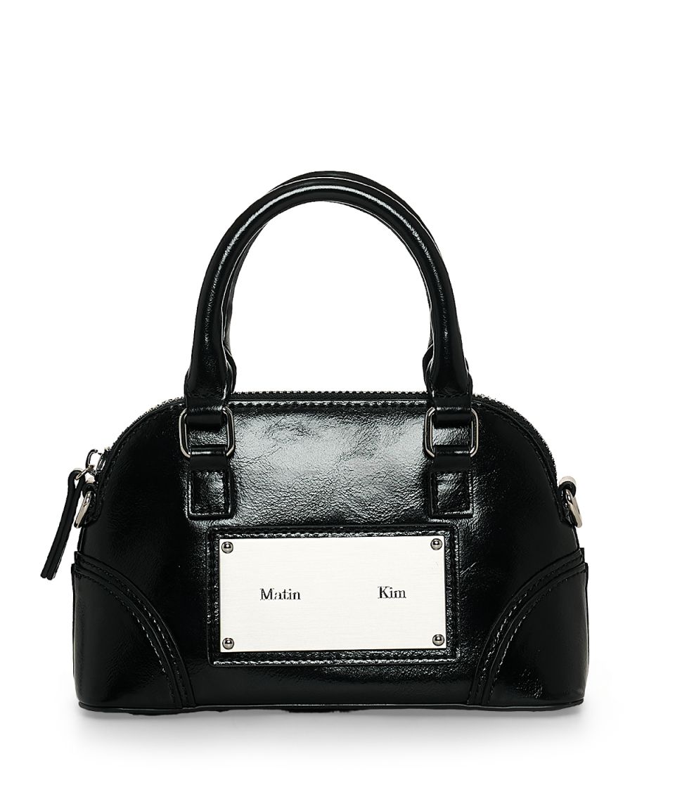 MUSINSA公式 | MATIN KIM CURVE ZIP MINI BAG IN BLACK