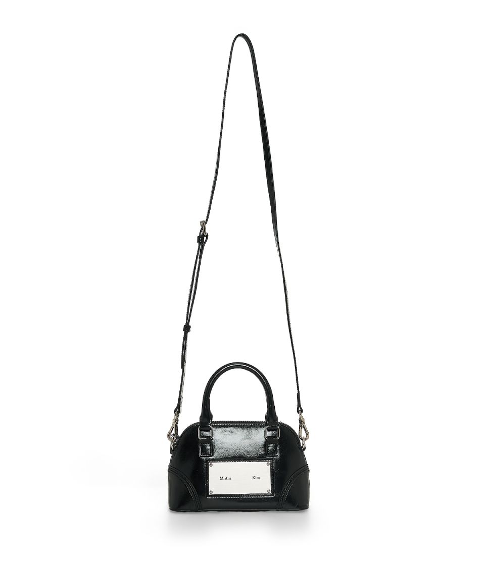 MUSINSA公式 | MATIN KIM CURVE ZIP MINI BAG IN BLACK