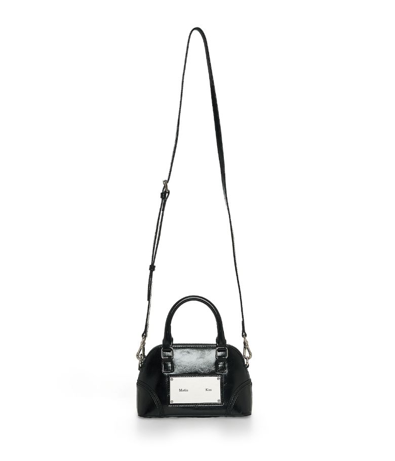 MUSINSA | MATIN KIM CURVE ZIP MINI BAG IN BLACK