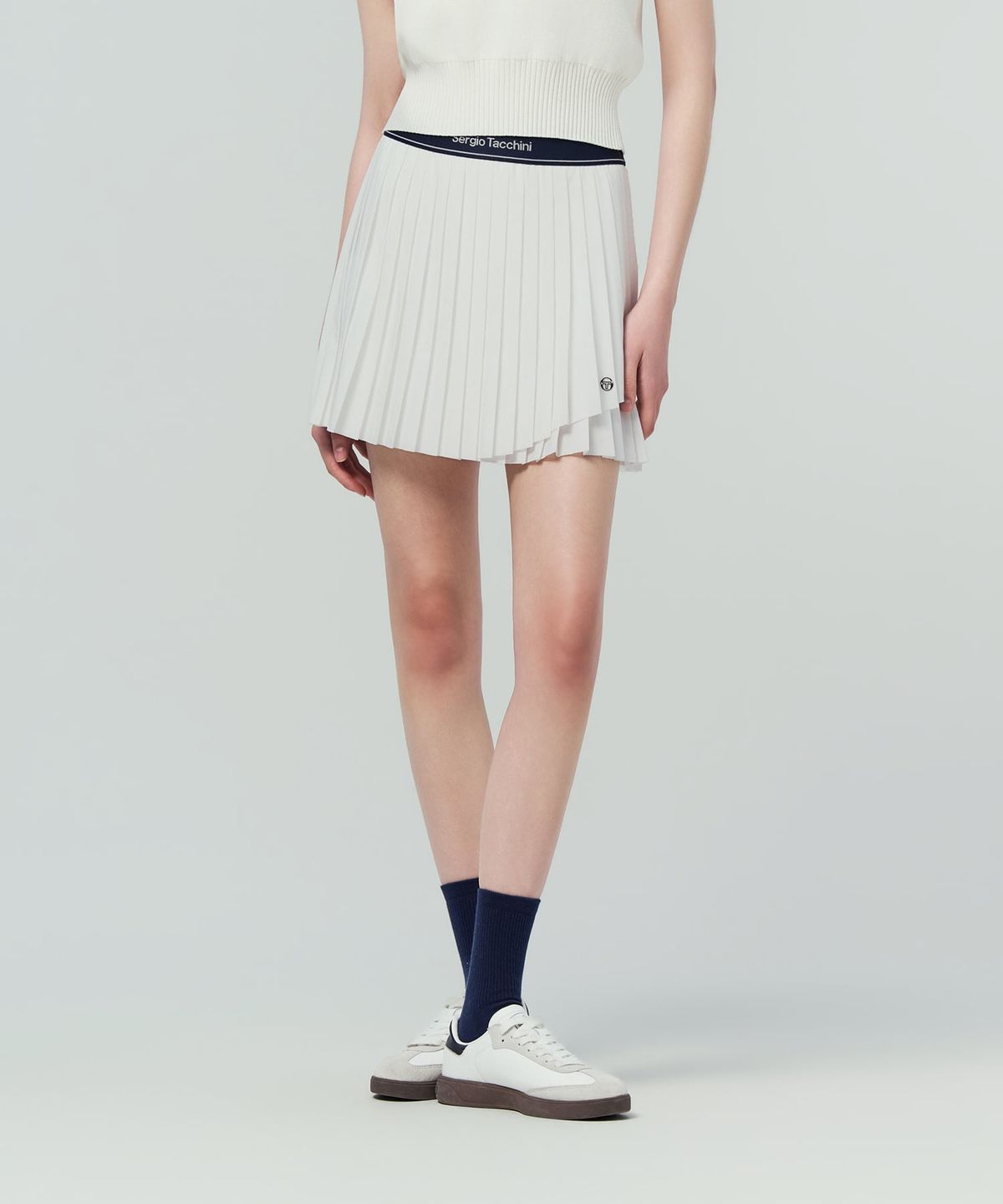 세르지오 타키니(SERGIO TACCHINI) W 플라잉 언밸런스 플리츠 스커트 (White)