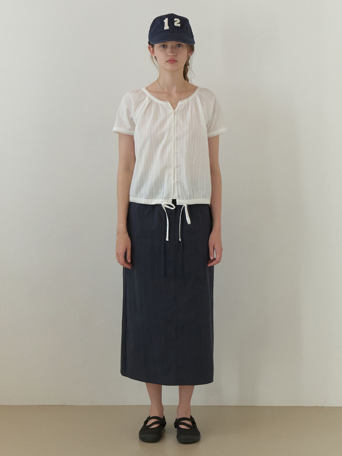 더미튼(THEMITTEN) Ridge button H skirt (navy)