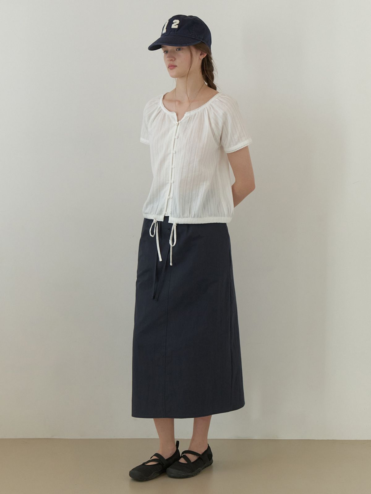 더미튼(THEMITTEN) Ridge button H skirt (navy)