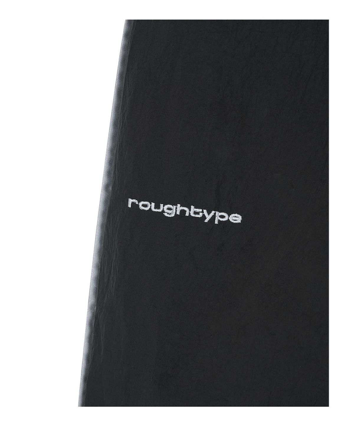 로타입(ROUGHTYPE) Piping Sewing Line Point Nylon Pants - Black
