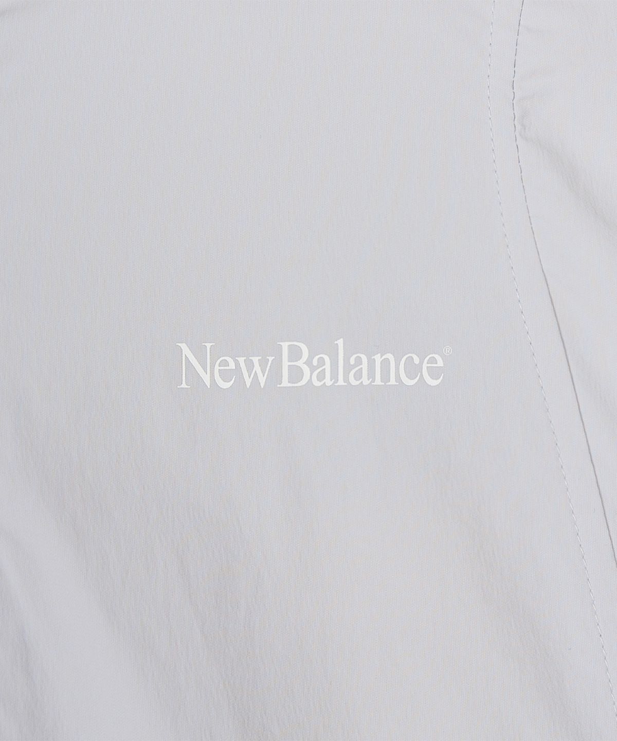 뉴발란스(NEW BALANCE) NBNCG3W612 / WOMEN FROZEN 우븐 스트레치 반집업 (L/BLUE)