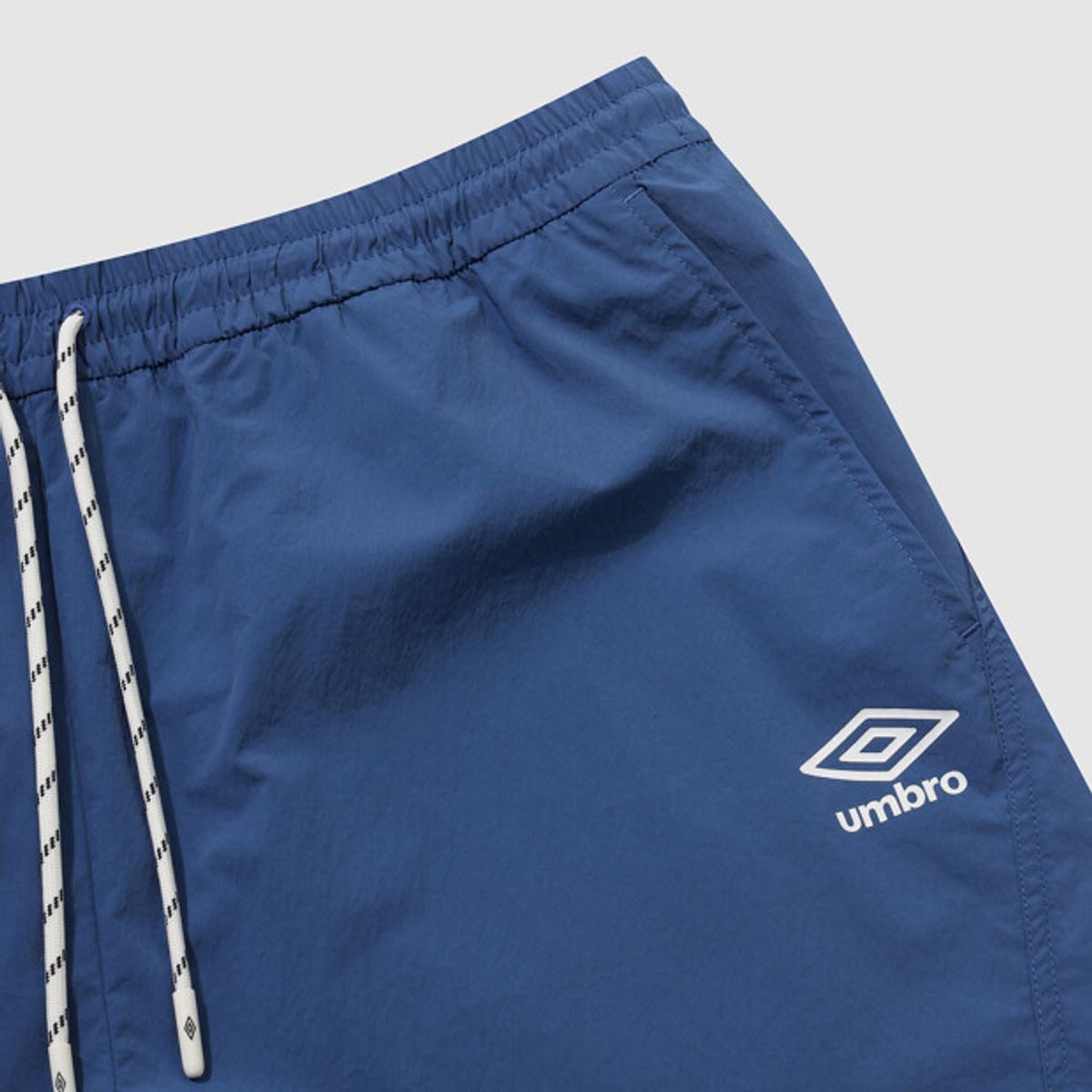 엄브로(UMBRO) 다이아몬드 이스케이프 나일론 스판 4.5부 반바지 블루 UR213CHP52