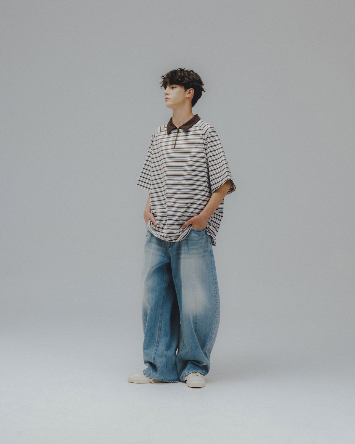 앵글런(ANGLAN) Striped Raglan Half-Zip Polo - Brown