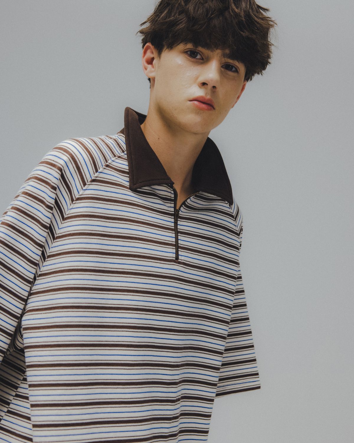 앵글런(ANGLAN) Striped Raglan Half-Zip Polo - Brown