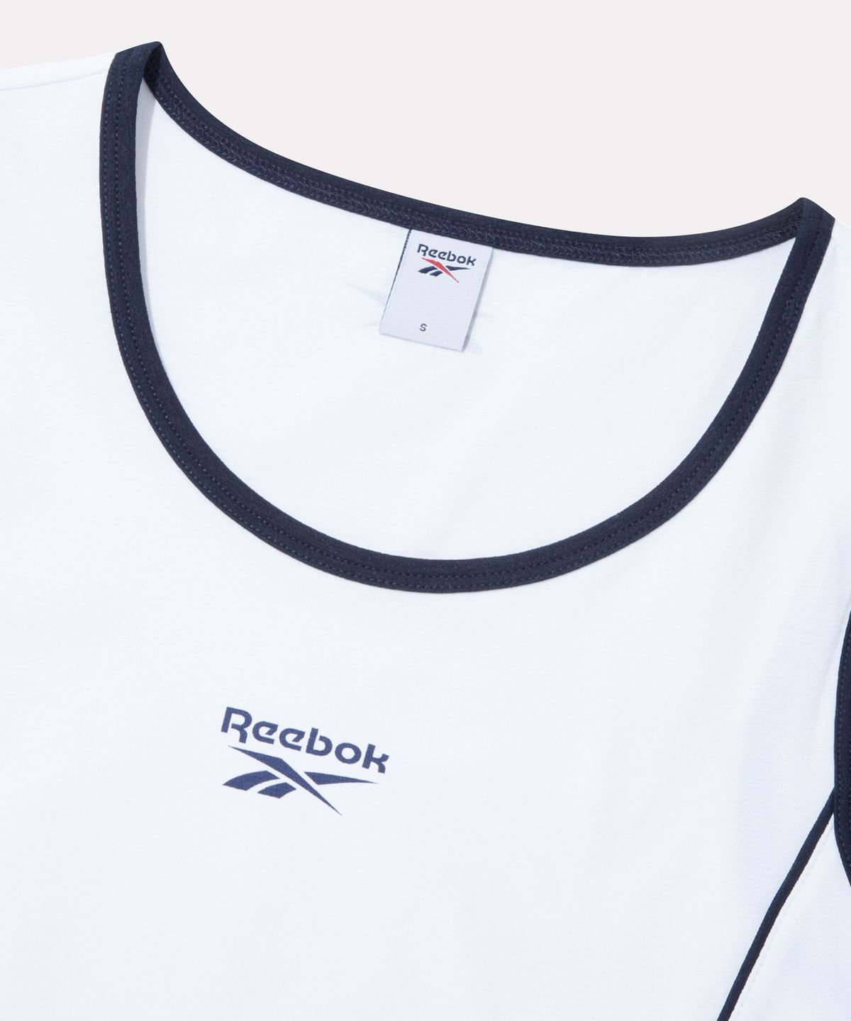 리복(REEBOK) 파이핑 프레쉬 링거 탱크 탑 (W) - 화이트