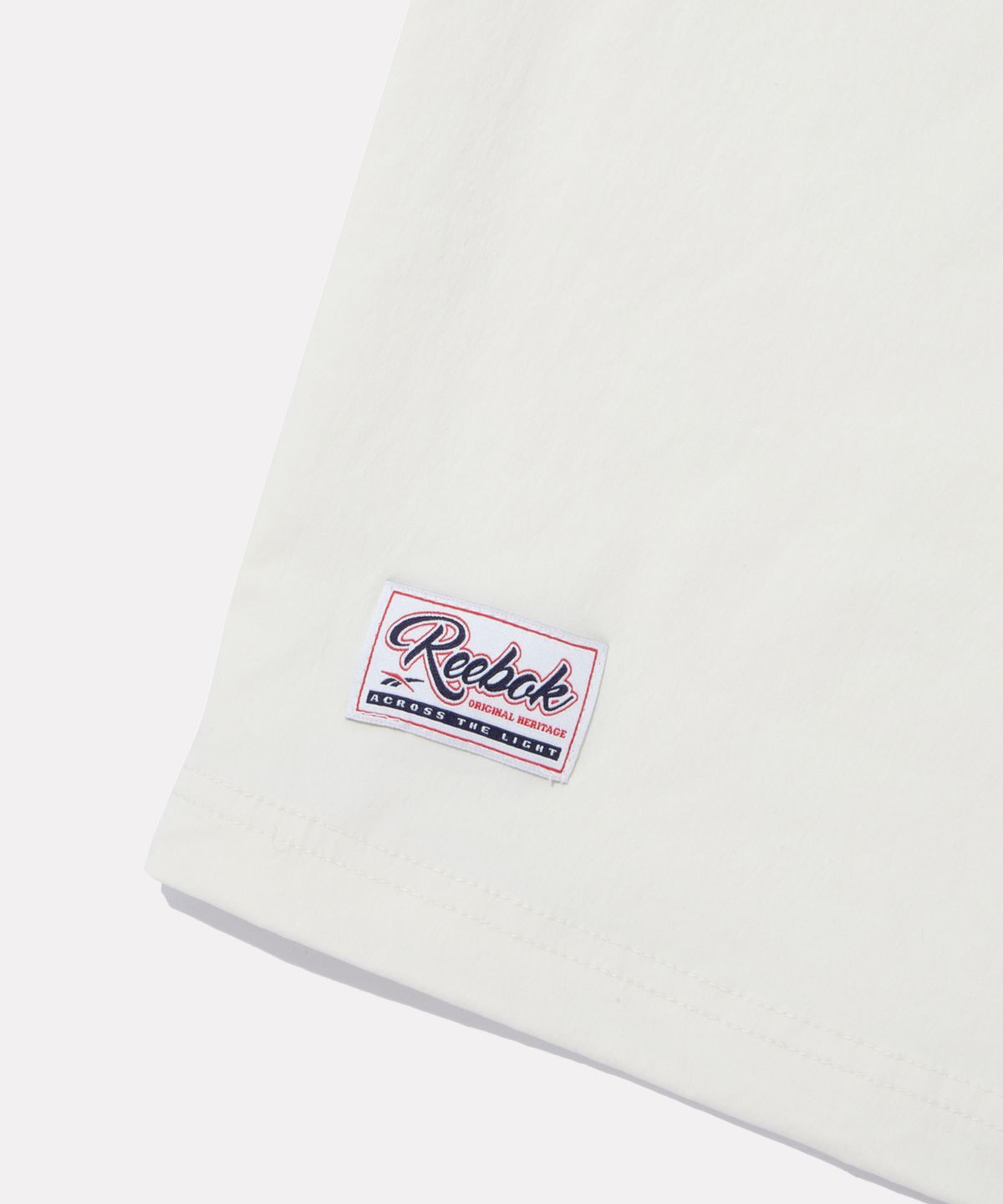 리복(REEBOK) 어센틱 로고 반팔 피스테 - 크림