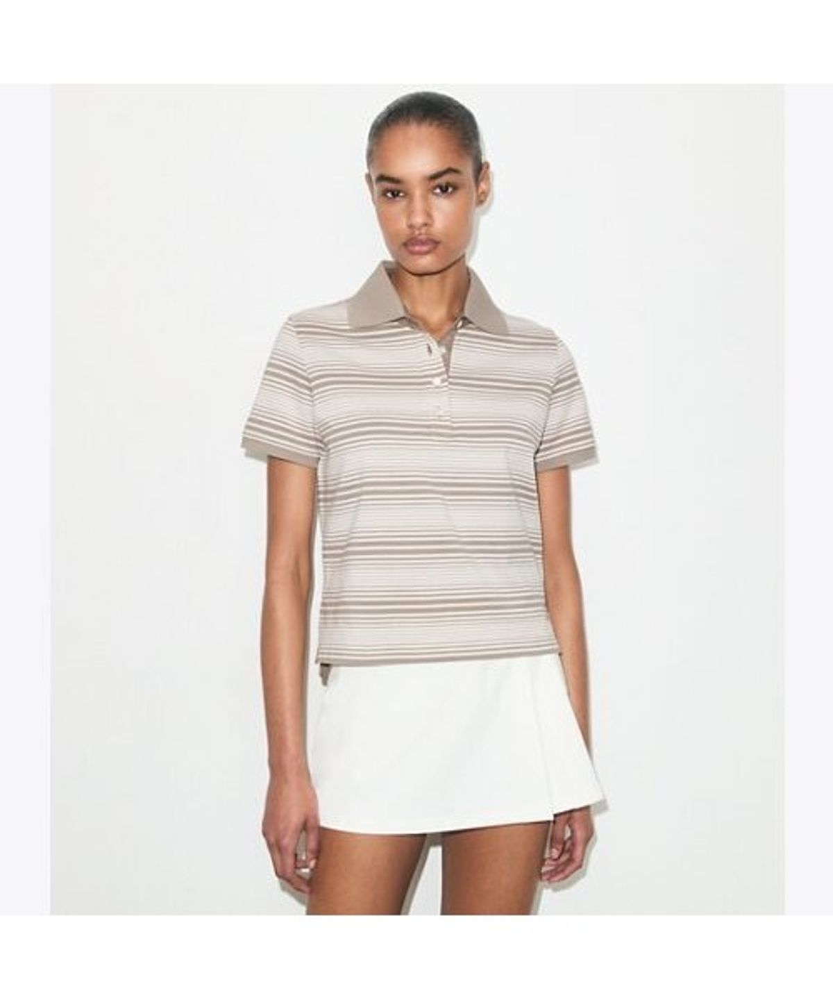 토리버치(TORYBURCH) 스트라이프드 코튼 폴로 - 토프 스트라이프